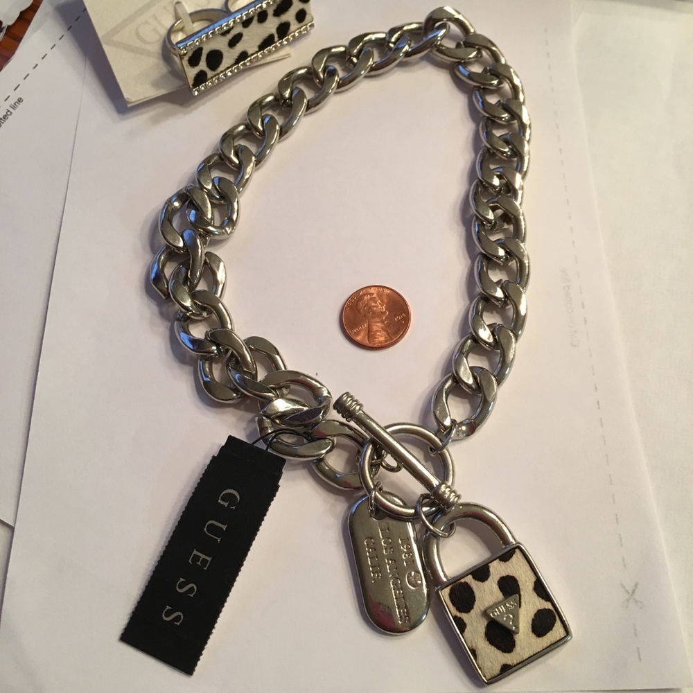 NWT Guess silver metal & hair calf tag necklace